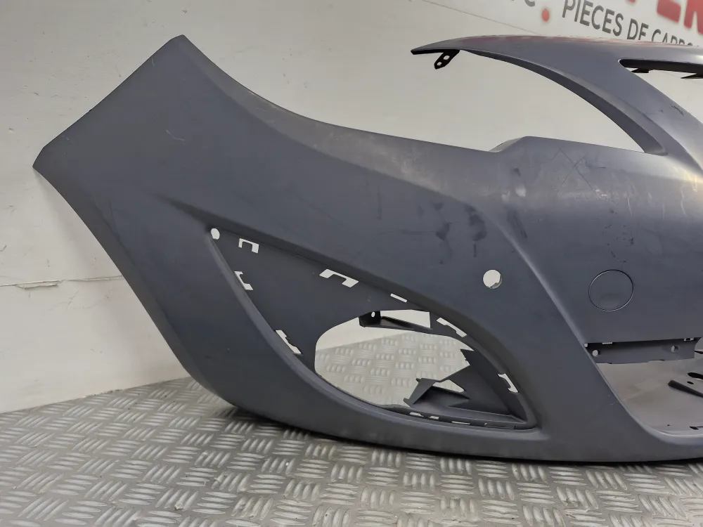 Opel Astra J Phase 1 (10/2010–07/2012) etupuskuri — alkuperäinen uusi, maalattava