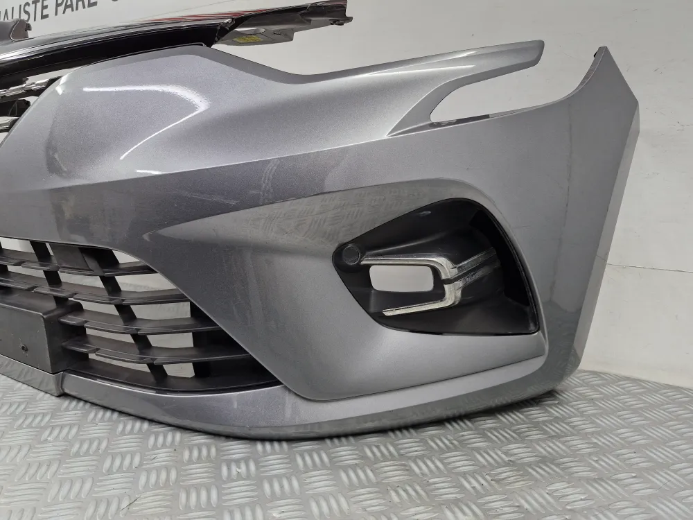 Renault Clio 5 Vaihe 1 tummanharmaa (2019+) etupuskuri 100 % alkuperäinen valmistajalta käytetty