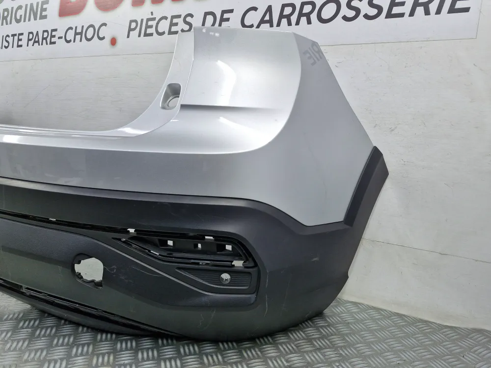 Volkswagen Taigo (10/2021) alkuperäinen takapuskurin suojus käytetty