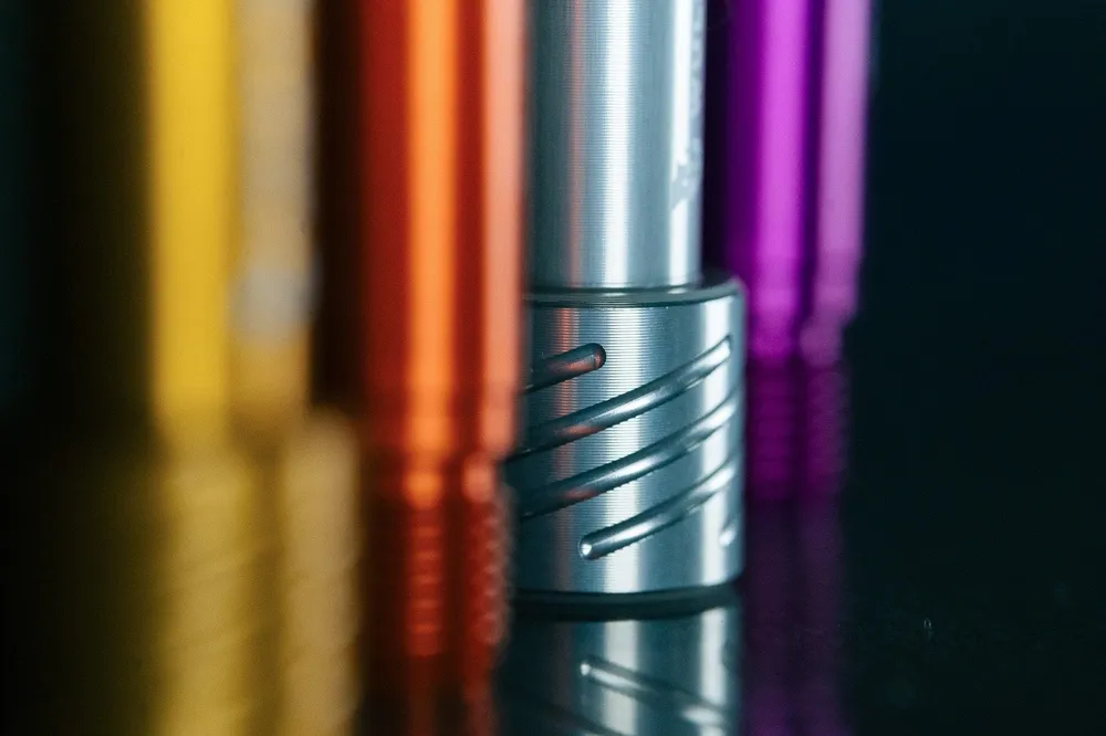 WOLF TOOTH etupyörän akseli FOX 36/38 haarukoille 15x110 mm Boost Orange