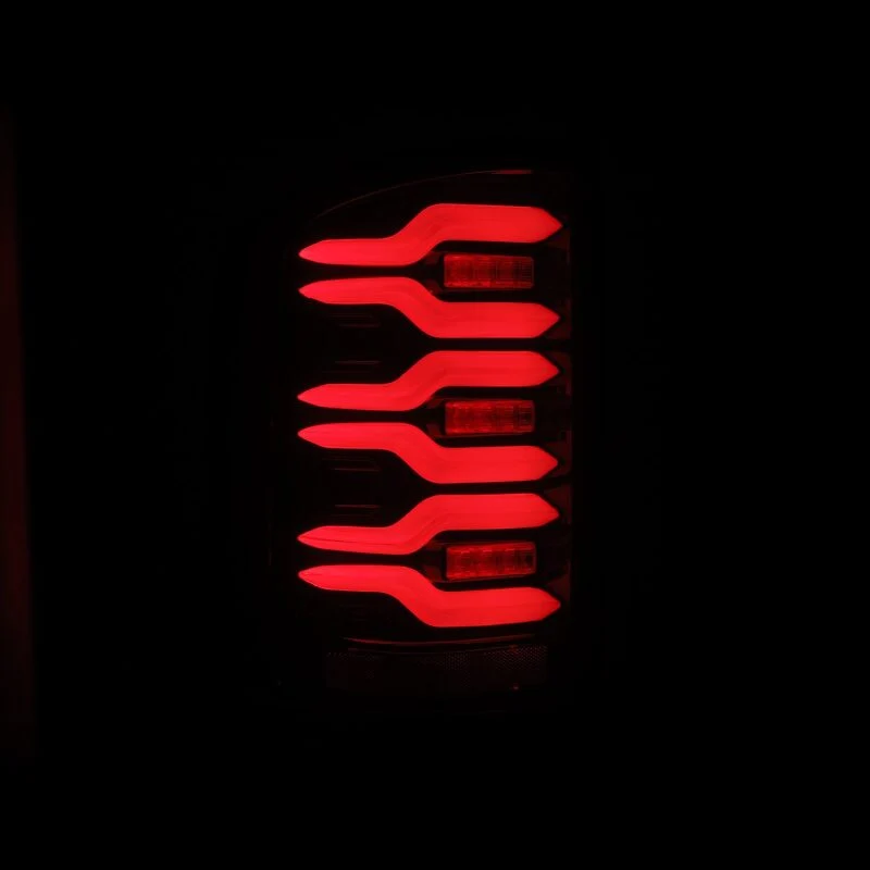 AlphaRex 14-18 GMC Sierra 1500/2500HD/3500HD LUXX-Series LED Tail Lights Blk/Red w/Actv Lgt Seq. Sig
